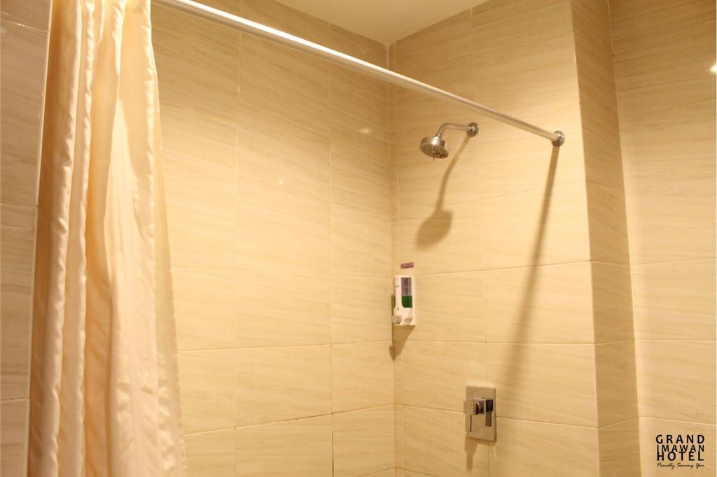 Grand Imawan Hotel Макасар Номер фото